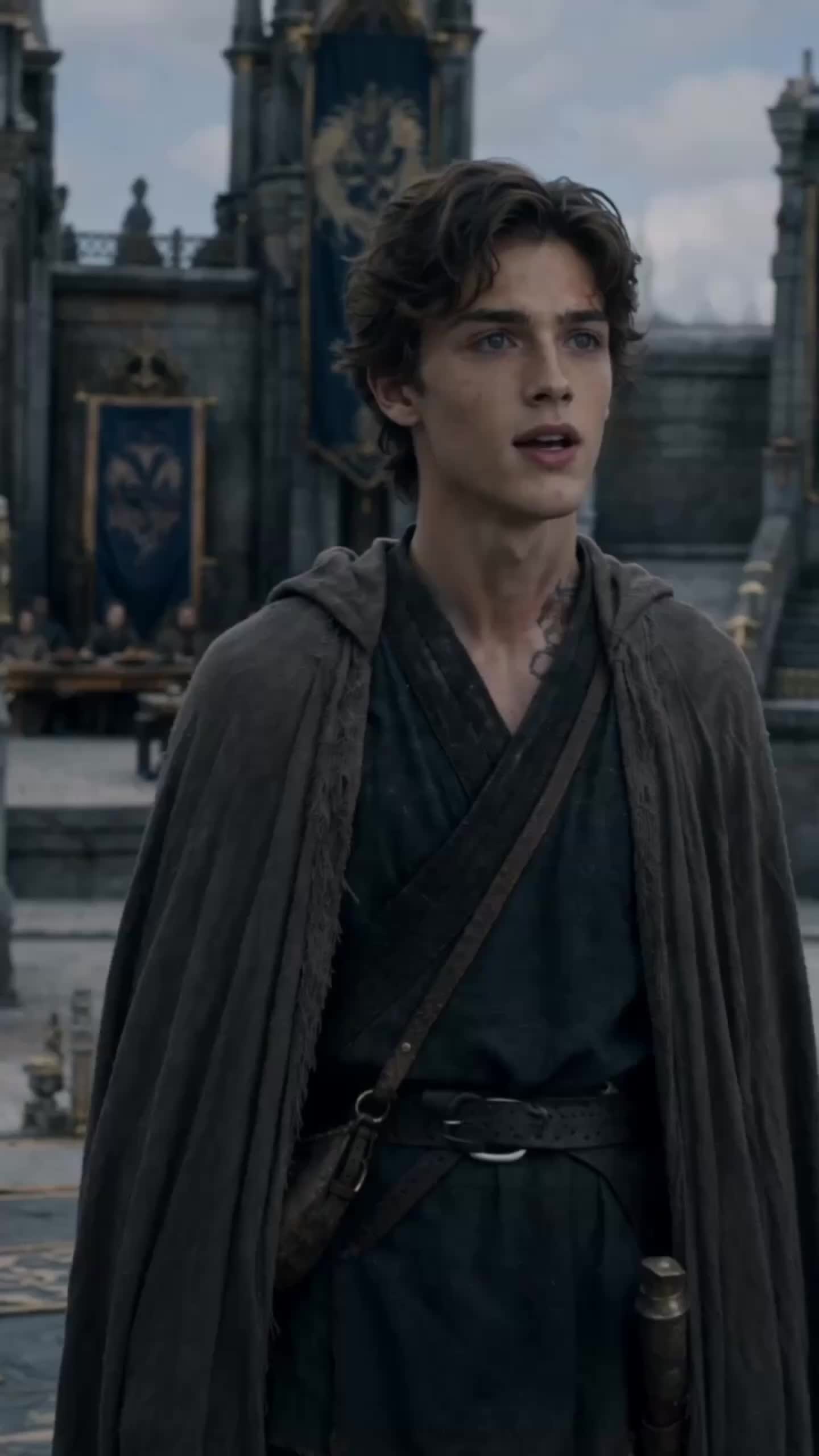 Owen Hale in a grey cloak looking up in the arena, with the dragon mark on his neck and banners behind him