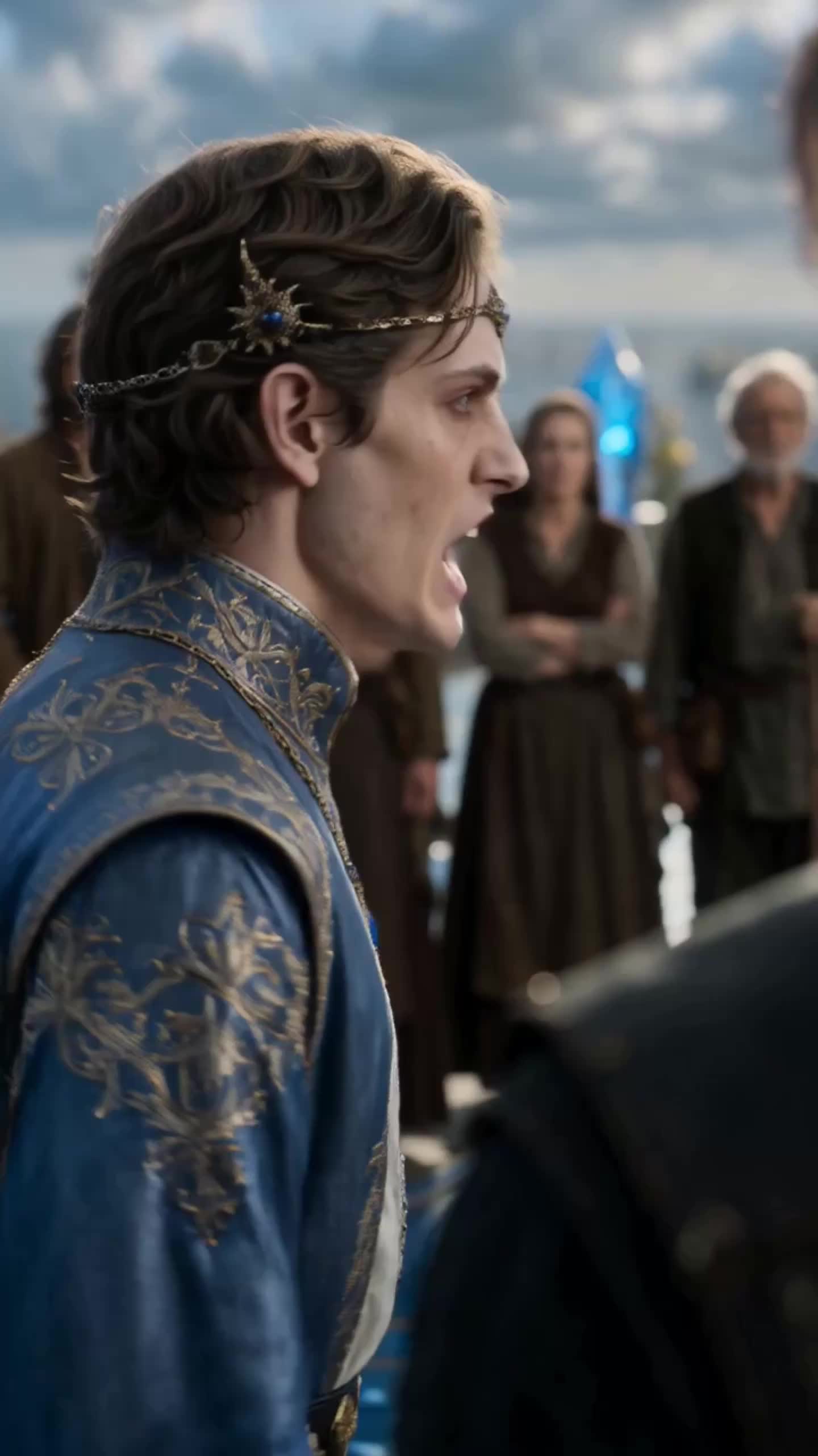 A young man with wavy brown hair and a gold circlet set with a blue gem, in a blue doublet embroidered in gold, shouting in profile at someone in black, with an older woman and an older man behind him